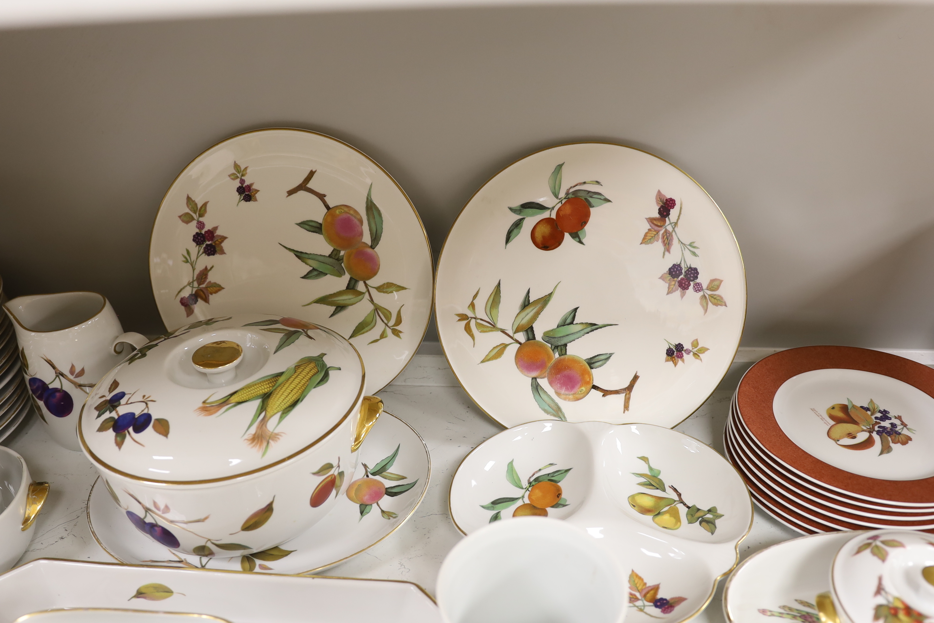 A large quantity of Worcester Evesham dinnerware, including; plates, bowls, serving dishes, jugs, flan, dishes, etc. (70 pieces)